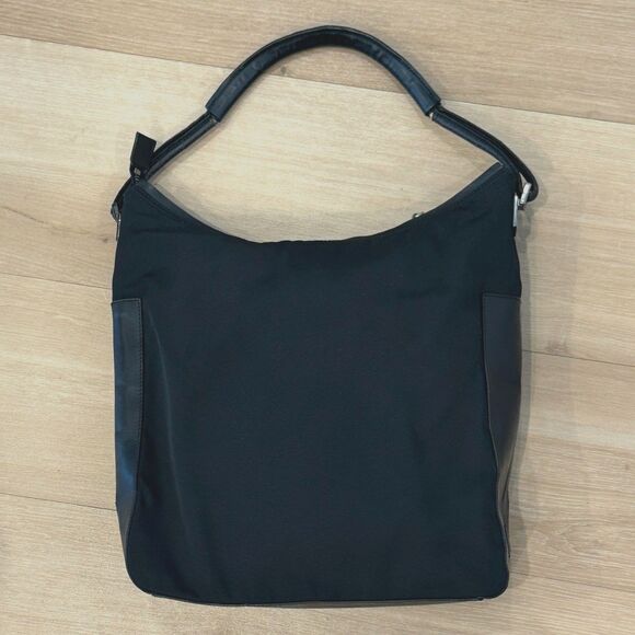 Gucci Handbags - GUCCI Leather Trimmed Black Canvas Shoulder Bag